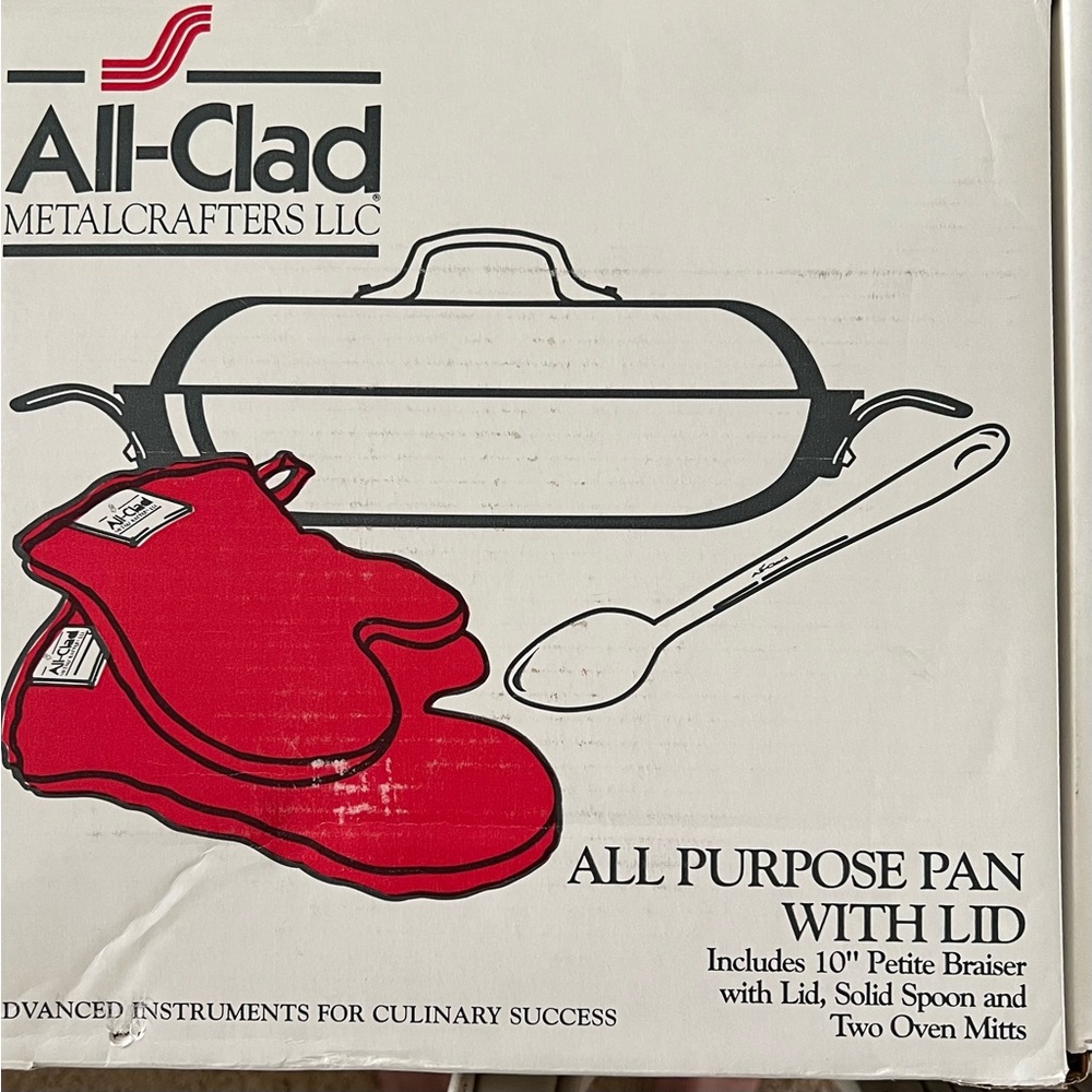 New. All-Clad pan with domed lid. Two beautiful red oven mitts & Spoon